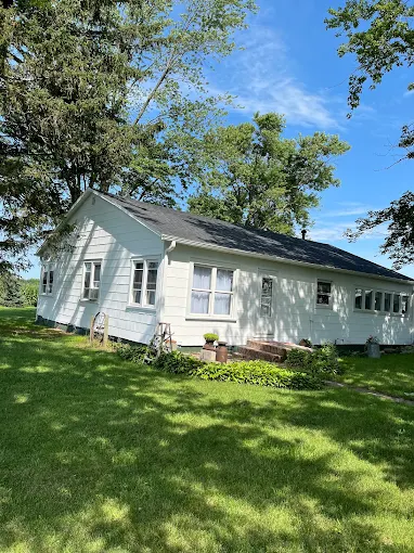 Freshly painted white farmhouse exterior